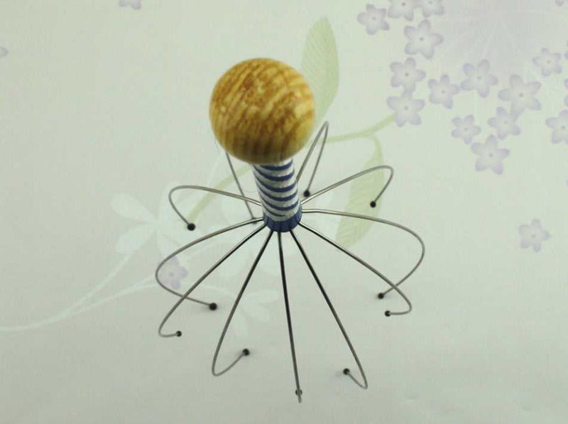 Octopus Scalp Massager Manual Head Massaging Claw for Relaxation with flexible metal prongs and colorful handle, ideal for stress relief.