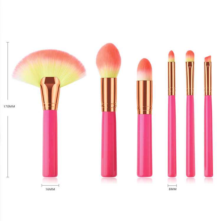 Cosmetic makeup brush set with soft synthetic bristles and pink handles, ideal for professional beauty and home use applications.
