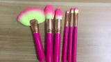 Cosmetic makeup brush set with soft synthetic bristles and pink handles, ideal for professional beauty and home use applications.