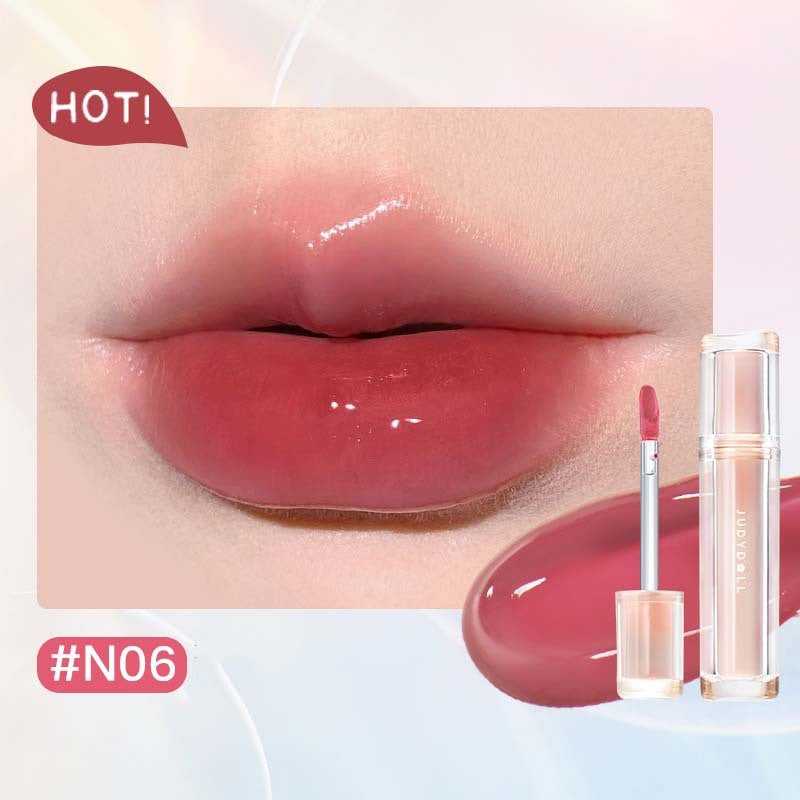 Iced Tea Mirror Lip Gloss Glassy Brown Jelly Lipstick Shine in four shades: Citrus, Brown, Violet, and Peach. Sleek tubes with glossy finish.