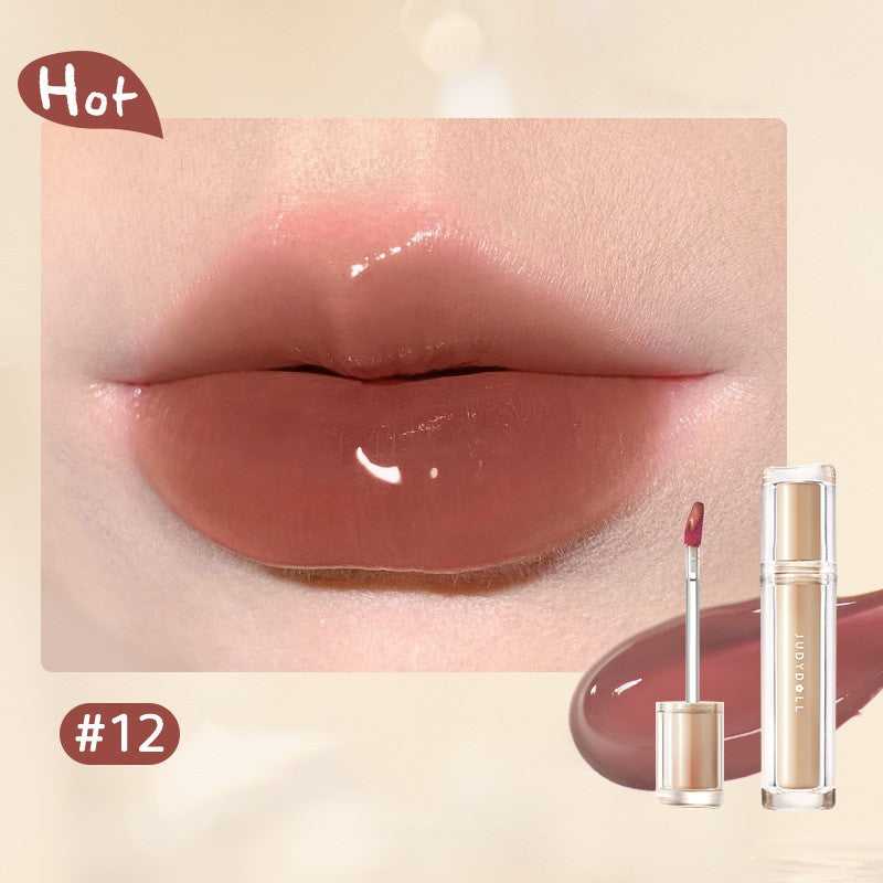 Iced Tea Mirror Lip Gloss Glassy Brown Jelly Lipstick Shine in four shades: Citrus, Brown, Violet, and Peach. Sleek tubes with glossy finish.