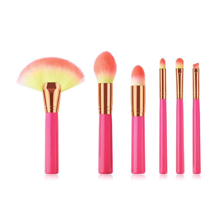 Cosmetic makeup brush set with soft synthetic bristles and pink handles, ideal for professional beauty and home use applications.
