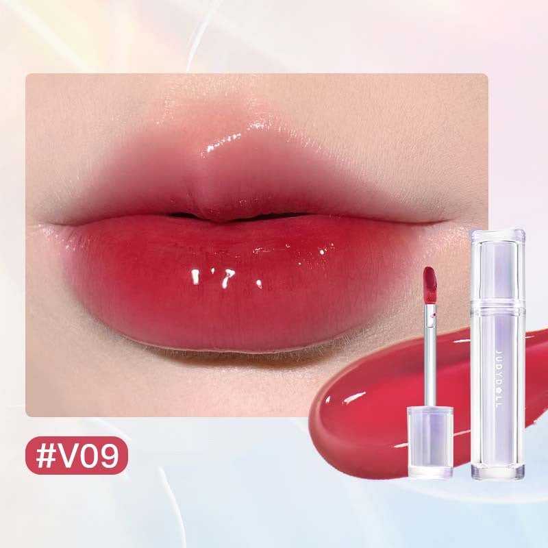 Iced Tea Mirror Lip Gloss Glassy Brown Jelly Lipstick Shine in four shades: Citrus, Brown, Violet, and Peach. Sleek tubes with glossy finish.