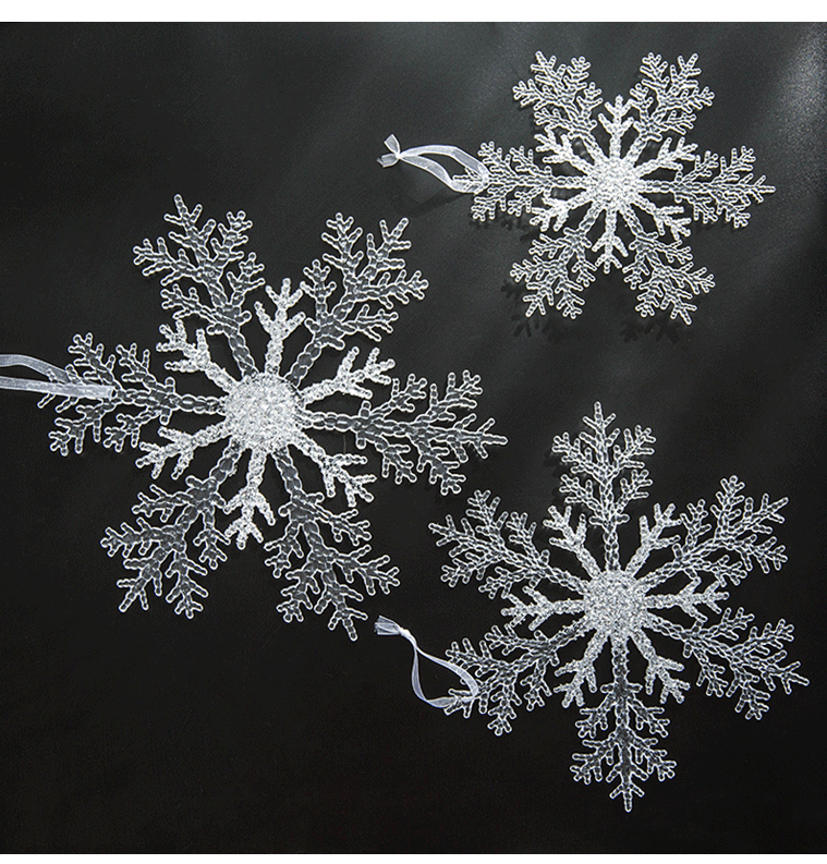 Acrylic Snowflake Christmas Decorations Transparent Tree Pendants hanging on a snowy Christmas tree. Ideal for DIY holiday decor and winter themes.